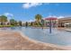 This zero entry community pool has a splash pad with recreational water features at 1128 Cavender Creek Rd, Minneola, FL 34715