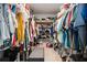Spacious walk-in closet offers ample storage with shelving and hanging space at 1128 Cavender Creek Rd, Minneola, FL 34715