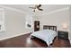 Cozy bedroom featuring a ceiling fan, and an expansive window, offering lots of natural light at 1281 Gatewood Ave, Minneola, FL 34715
