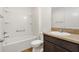 Bathroom featuring a shower-tub combo and single sink vanity at 1409 Gatlin Pl, The Villages, FL 32163