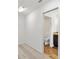 Walk-in closet featuring plush carpeting and access to the bathroom at 1409 Gatlin Pl, The Villages, FL 32163