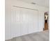Bedroom closet featuring bi-fold doors at 1409 Gatlin Pl, The Villages, FL 32163