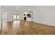 Spacious living room with sliding glass doors leading to the backyard at 1409 Gatlin Pl, The Villages, FL 32163