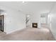Living room with neutral carpet, a fireplace, a staircase, and lots of natural light at 1413 Silverthorn Dr, Orlando, FL 32825