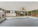 Spacious screened-in porch with a ceiling fan and views of the backyard at 1413 Silverthorn Dr, Orlando, FL 32825