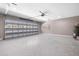 This is a spacious garage with an automatic door at 155 W C-466, Lot # 1 W C 466, Oxford, FL 34484