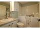 Well lit bathroom featuring walk in tub and bright fixtures at 17194 Se 85Th Willowick Cir, The Villages, FL 32162
