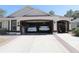 Spacious three car garage with ample room for storage at 17194 Se 85Th Willowick Cir, The Villages, FL 32162