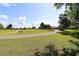 Scenic view of the golf course offering a peaceful and picturesque setting for outdoor enjoyment at 17194 Se 85Th Willowick Cir, The Villages, FL 32162