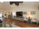 Open-concept living area with hardwood floors and comfortable seating at 17194 Se 85Th Willowick Cir, The Villages, FL 32162