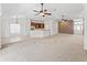 Open living space with seamless transition to the kitchen area at 17427 Se 72Nd Overbrook Ct, The Villages, FL 32162
