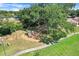 Overhead view of a playground within a neighborhood with mature trees at 1761 Country Terrace Ln, Apopka, FL 32703