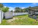 The large backyard offers a storage shed and a privacy fence, perfect for outdoor activities at 1761 Country Terrace Ln, Apopka, FL 32703