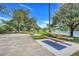 Community picnic area with tables close to the lake at 1761 Country Terrace Ln, Apopka, FL 32703