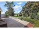 Spacious backyard with beautiful pond views and manicured landscaping, creating a peaceful oasis at 17800 Se 91St Gaylark Ave, The Villages, FL 32162