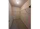 A walk-in closet with carpet and wire shelving at 1812 Sanibel Ct, The Villages, FL 32162