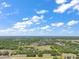 Aerial view of bordered property showing trees, open space, and potential for serene, secluded living at 19621 Lake Lincoln Ln, Eustis, FL 32736