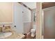 Bathroom with granite vanity and a shower at 19621 Lake Lincoln Ln, Eustis, FL 32736
