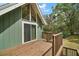 Exterior view of a deck on a green house at 19621 Lake Lincoln Ln, Eustis, FL 32736