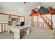 Bright home office space with custom built-ins and a loft area at 19621 Lake Lincoln Ln, Eustis, FL 32736