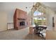 Comfortable office space with brick fireplace, and sliding doors for lots of light at 19621 Lake Lincoln Ln, Eustis, FL 32736