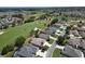 Scenic aerial shot of a golf course community with houses nestled along the fairways at 1985 Abordale Ln, The Villages, FL 32162