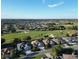 Picture of a residential area near a golf course with many houses and green spaces at 1985 Abordale Ln, The Villages, FL 32162