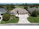Charming home with a well-manicured lawn, a decorative driveway, and an inviting entrance at 1985 Abordale Ln, The Villages, FL 32162