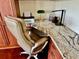 Office nook featuring a granite countertop desk with built-in drawers and a comfortable swivel chair at 1985 Abordale Ln, The Villages, FL 32162