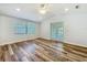 Bedroom with vaulted ceiling, wood-look flooring, and a window for natural light at 203 Se 30Th Ave, Ocala, FL 34471