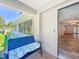 Welcoming front porch featuring a comfortable bench and a view of the side yard, with entry into the home at 203 Se 30Th Ave, Ocala, FL 34471