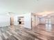 Spacious open floor plan featuring updated flooring, recessed lighting, and seamless flow between living spaces at 203 Se 30Th Ave, Ocala, FL 34471