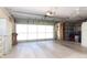 Spacious two-car garage with ample storage space and overhead lighting at 20631 Prince Ranier Pl, Leesburg, FL 34748