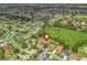 Bird's eye view of home in a mature, green neighborhood; golf course nearby at 2259 Lockwood Loop, The Villages, FL 32162