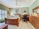 Bedroom featuring carpet, accent lighting, and furniture at 24436 Madewood Ave, Leesburg, FL 34748