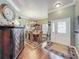 Inviting foyer with hardwood floors, and a decorative front door at 24436 Madewood Ave, Leesburg, FL 34748