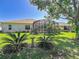 A beautiful backyard and screened patio that provides the perfect blend of indoor and outdoor living at 25523 Maurepas Ln, Leesburg, FL 34748