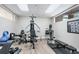 Well-equipped fitness center featuring various exercise machines and free weights for residents' use at 26736 Cash Ct, Leesburg, FL 34748