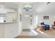 Bright foyer with high ceilings, decorative front door with tiled floors and an open floor plan at 26736 Cash Ct, Leesburg, FL 34748