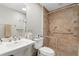 Bathroom featuring a vessel sink, updated shower, and a grab bar for added safety at 3049 Saint Thomas Ln, The Villages, FL 32162
