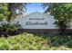 The Village of Glenbrook community entrance sign with lush landscaping at 3049 Saint Thomas Ln, The Villages, FL 32162