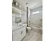 Bathroom featuring marble tile, a bathtub, and a shower at 3070 Sunscape Ter, Groveland, FL 34736