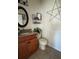 Cozy bathroom with tile floors, modern fixtures, and a decorative star hanging on the wall at 326 Crystal Pond Ave, Deland, FL 32720