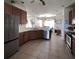 Spacious kitchen features stainless steel appliances, granite countertops, and plenty of cabinet space at 326 Crystal Pond Ave, Deland, FL 32720