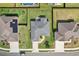 Aerial view showcasing the layout of a single-Gathering home with a spacious backyard and well-maintained landscaping at 3329 Boyd Cir, Oxford, FL 34484