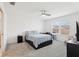 Neutral bedroom with carpet, light walls, and window with blinds at 3329 Boyd Cir, Oxford, FL 34484