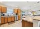 Kitchen featuring a granite countertop and stainless steel appliances at 3329 Boyd Cir, Oxford, FL 34484