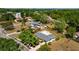 A cozy home with screened-in pool, fenced yard, nestled among trees, offering privacy and outdoor enjoyment at 3415 Sail Fish Ave, Fruitland Park, FL 34731