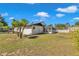 The backyard includes a screened patio and perimeter fencing at 3415 Sail Fish Ave, Fruitland Park, FL 34731