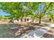 Lovely one-story home with stone accents, surrounded by mature shade trees and an inviting front yard at 3415 Sail Fish Ave, Fruitland Park, FL 34731
